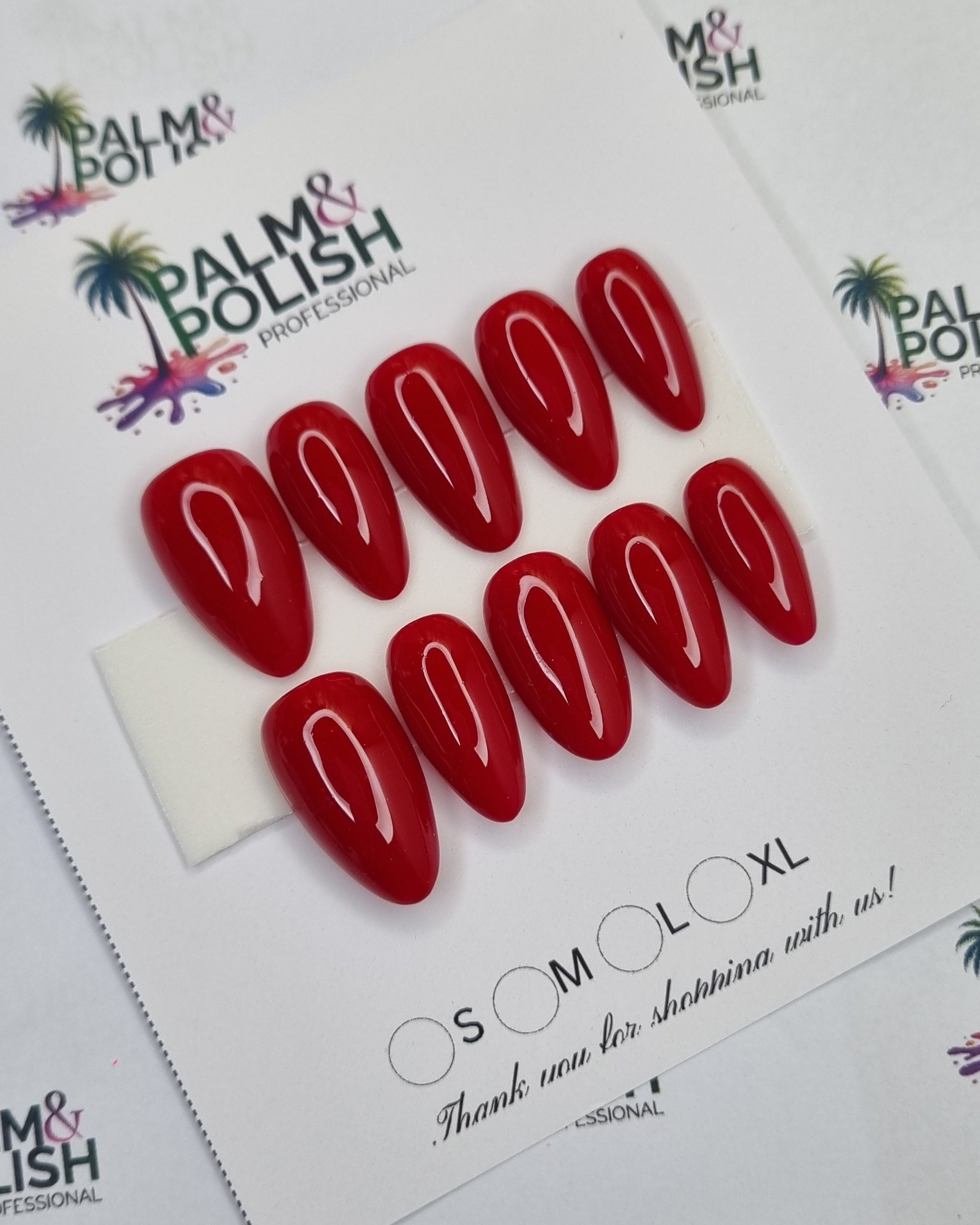 A sheet of red oval-shaped PRESSON      displayed on a white backing card, photographed from above on a white background with repeated Palm & Polish branding.